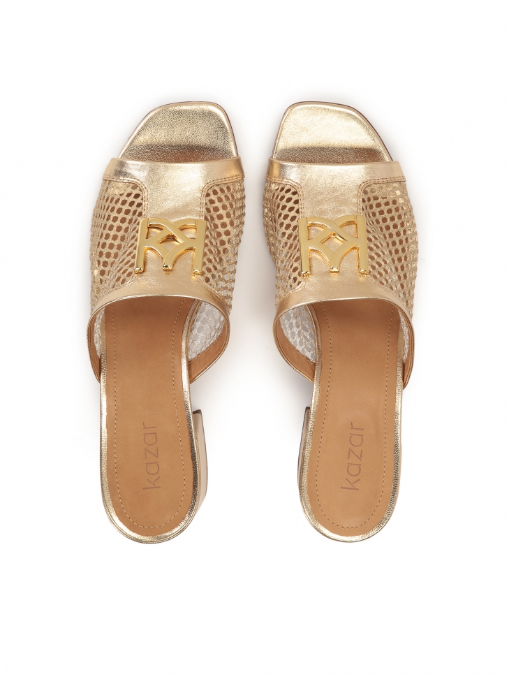 Ažurové zlaté mulety zdobené monogramem SAGE